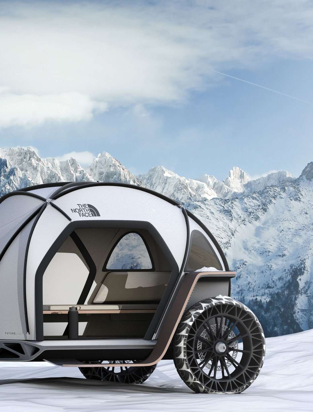 north face camper in the snowy mountains